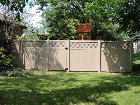 Image of a grey vinyl privacy fence