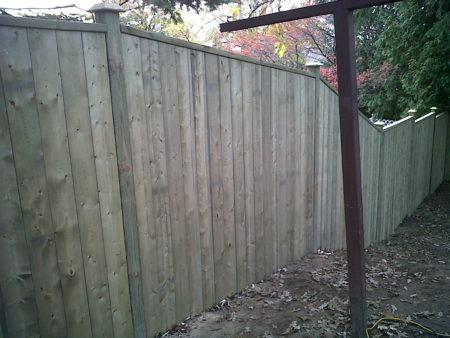 Sloping wood privacy fence style image